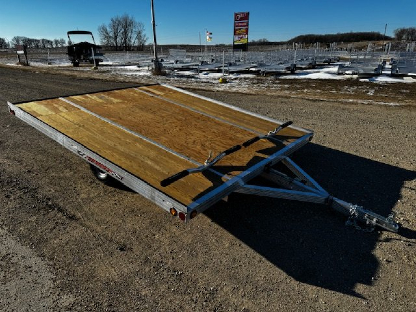 New 2025 10' TILT SLEDBED 2-PLACE SNOWMOBILE TRAILER by JB LUND