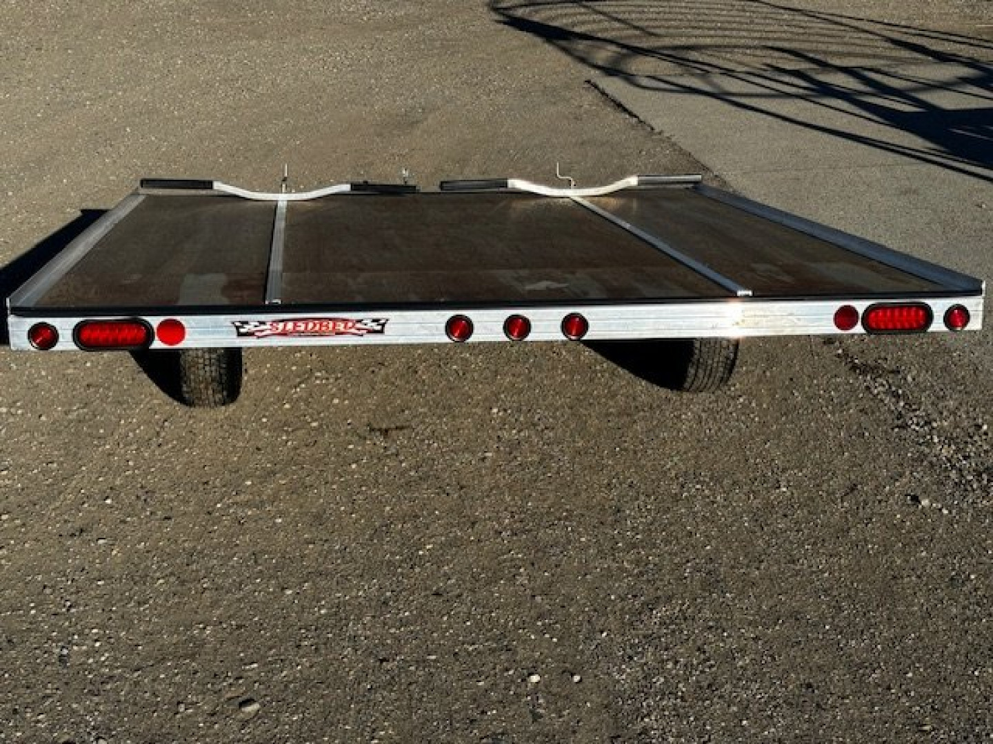 New 2025 10' TILT SLEDBED 2-PLACE SNOWMOBILE TRAILER by JB LUND