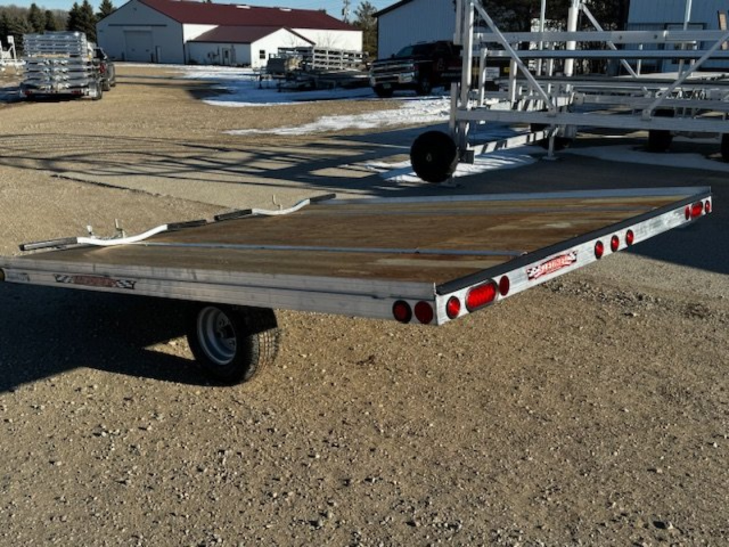 New 2025 10' TILT SLEDBED 2-PLACE SNOWMOBILE TRAILER by JB LUND