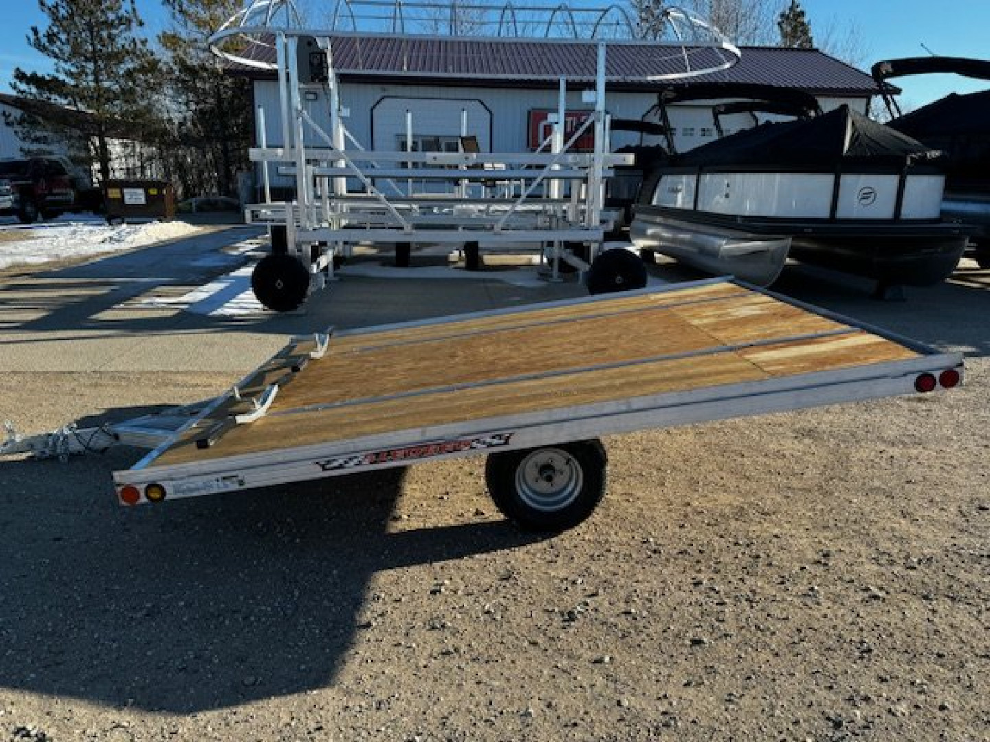 New 2025 10' TILT SLEDBED 2-PLACE SNOWMOBILE TRAILER by JB LUND