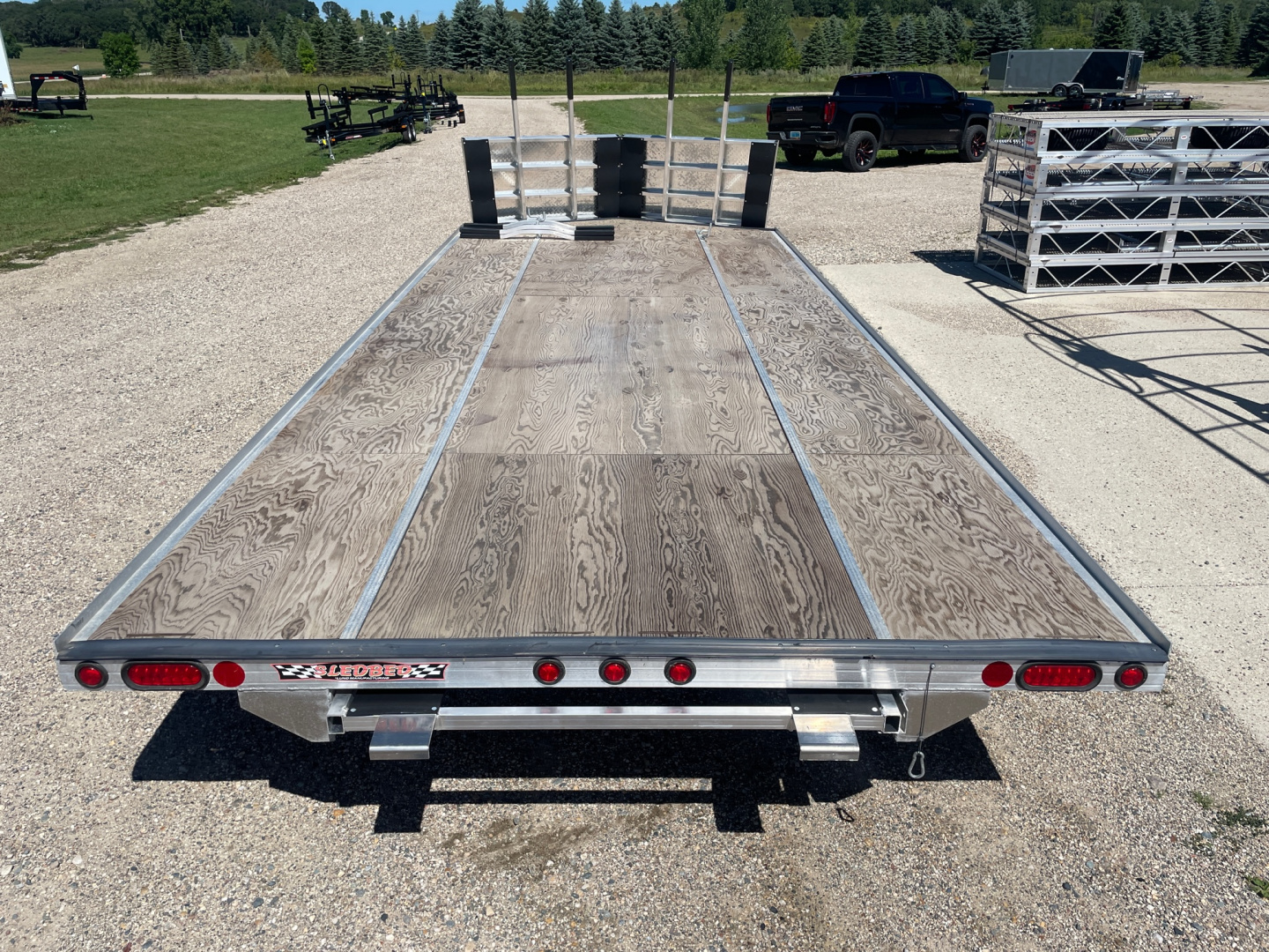 New 2024 22' V-FRONT SLEDBED 4-PLACE TANDEM AXLE SNOWMOBILE TRAILER w/SALT SHIELD by JB LUND