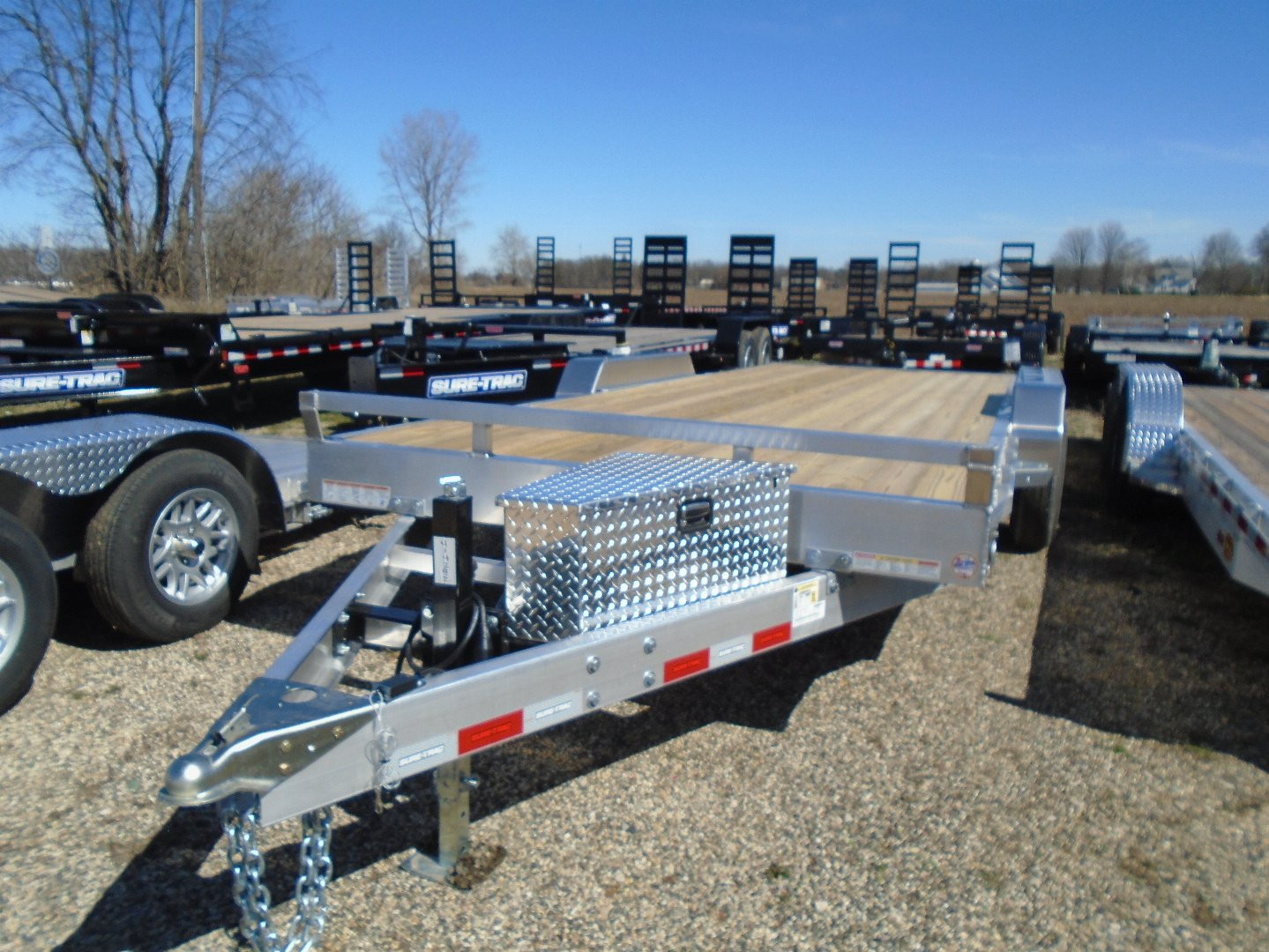 New 2024 Sure-Trac 82X20 10k Aluminum W/treaded wood deck powertilt Tilt Trailer