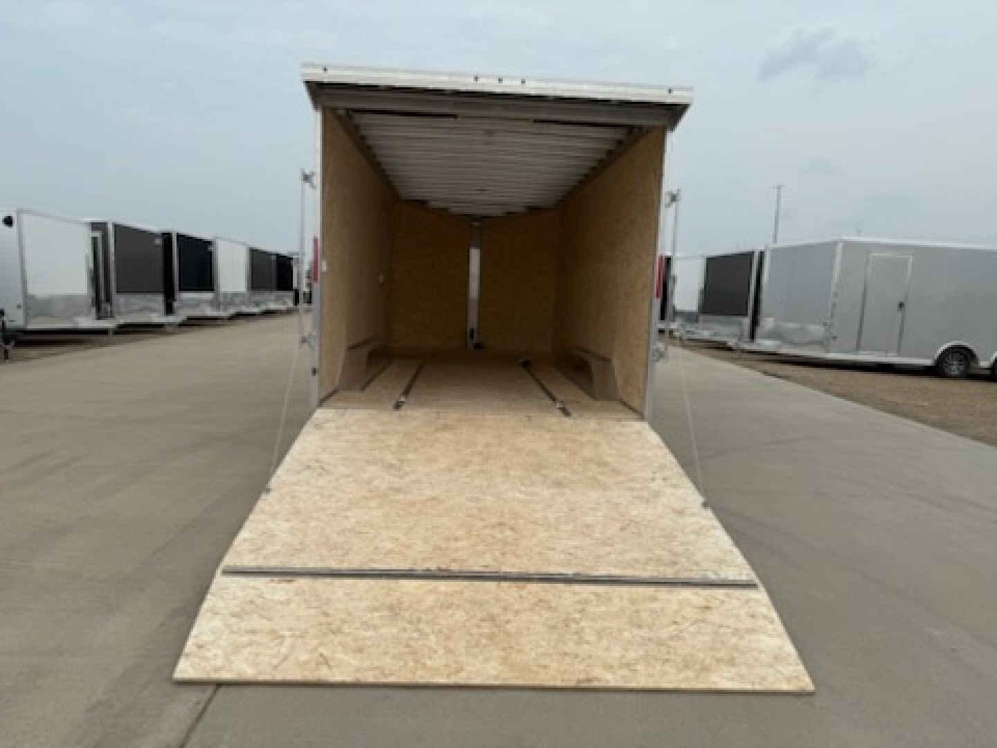 New 2026 E-Z Hauler EZEC8.5X18-UTV Cargo / Enclosed Trailer CAR HAULER