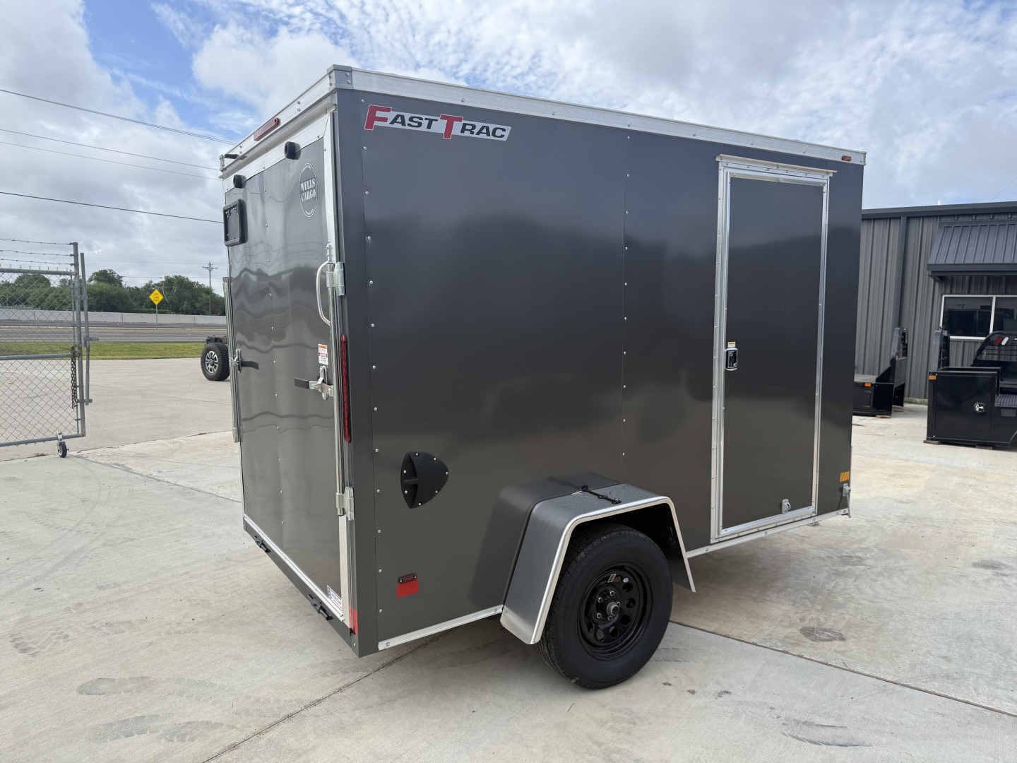 New 2025 Wells Cargo 6X10 RAMP DOOR SINGLE AXLE Cargo / Enclosed Trailer