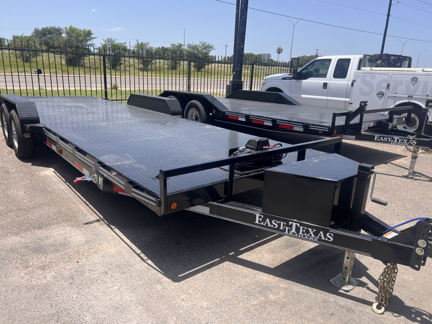 New 2026 East Texas Trailers 83x22ft Tilt Car Hauler