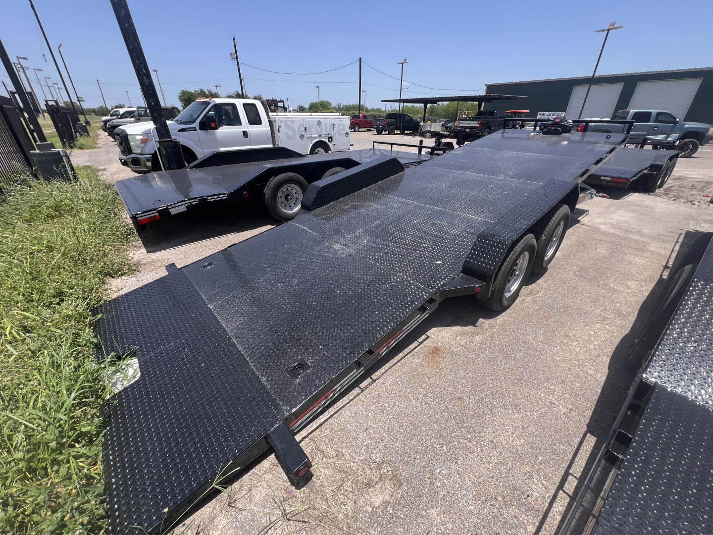 New 2026 East Texas Trailers 83x22ft Tilt Car Hauler