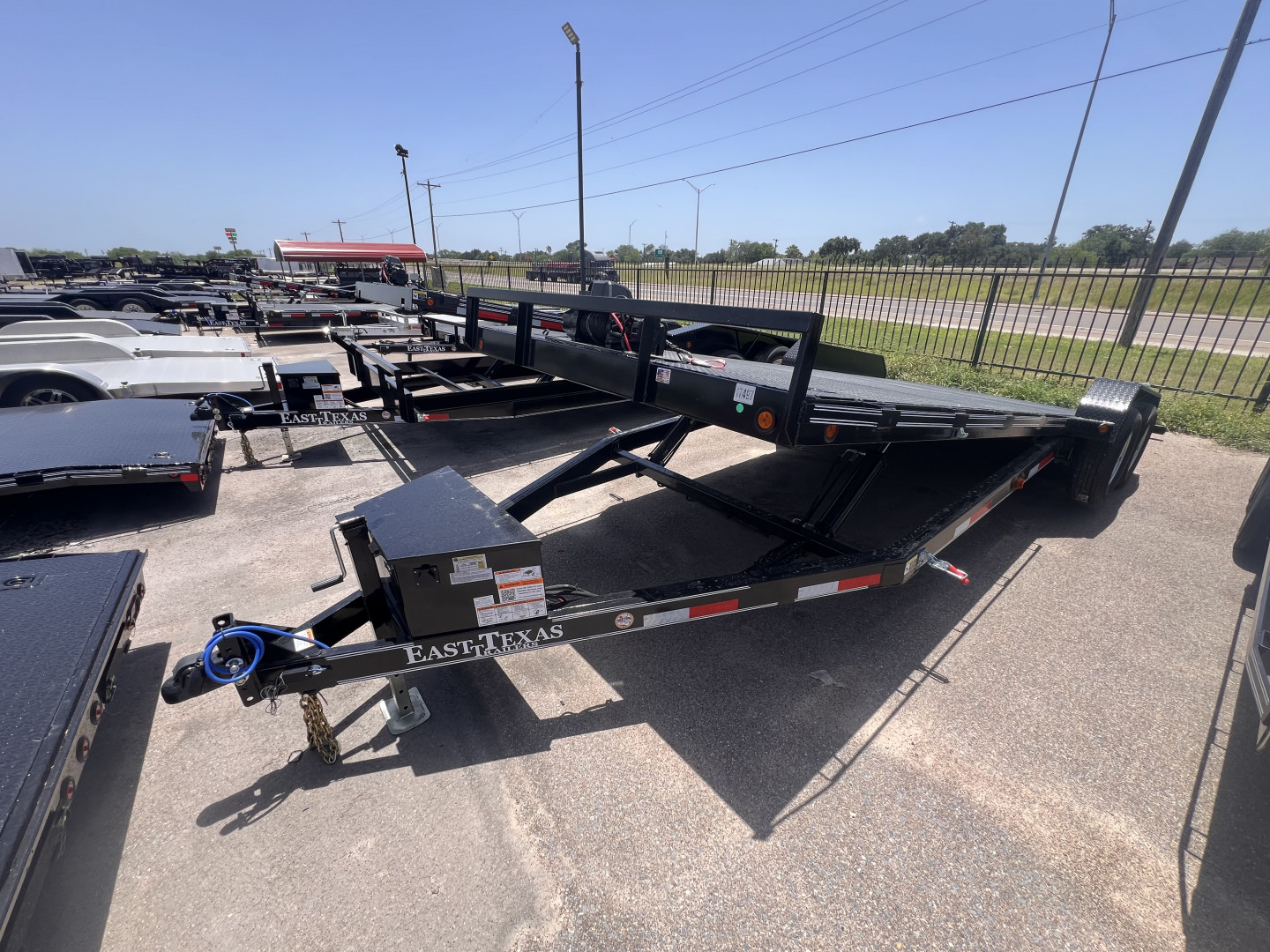New 2026 East Texas Trailers 83x22ft Tilt Car Hauler