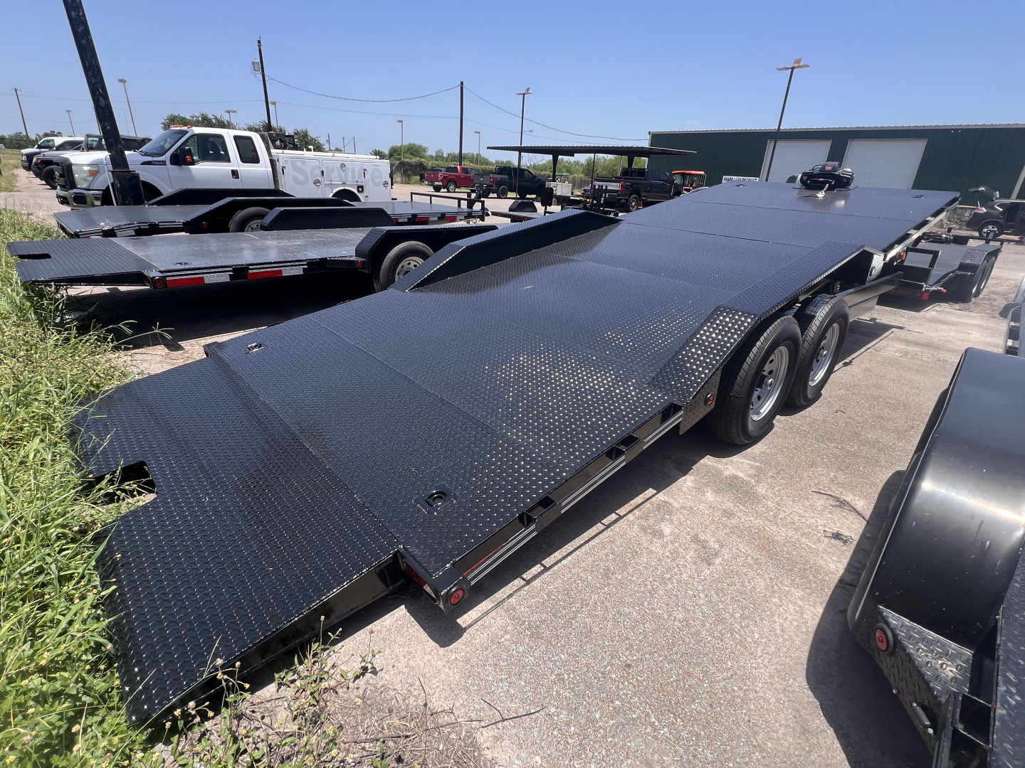 New 2026 East Texas Trailers 102x22ft Tilt Car Hauler w/Winch