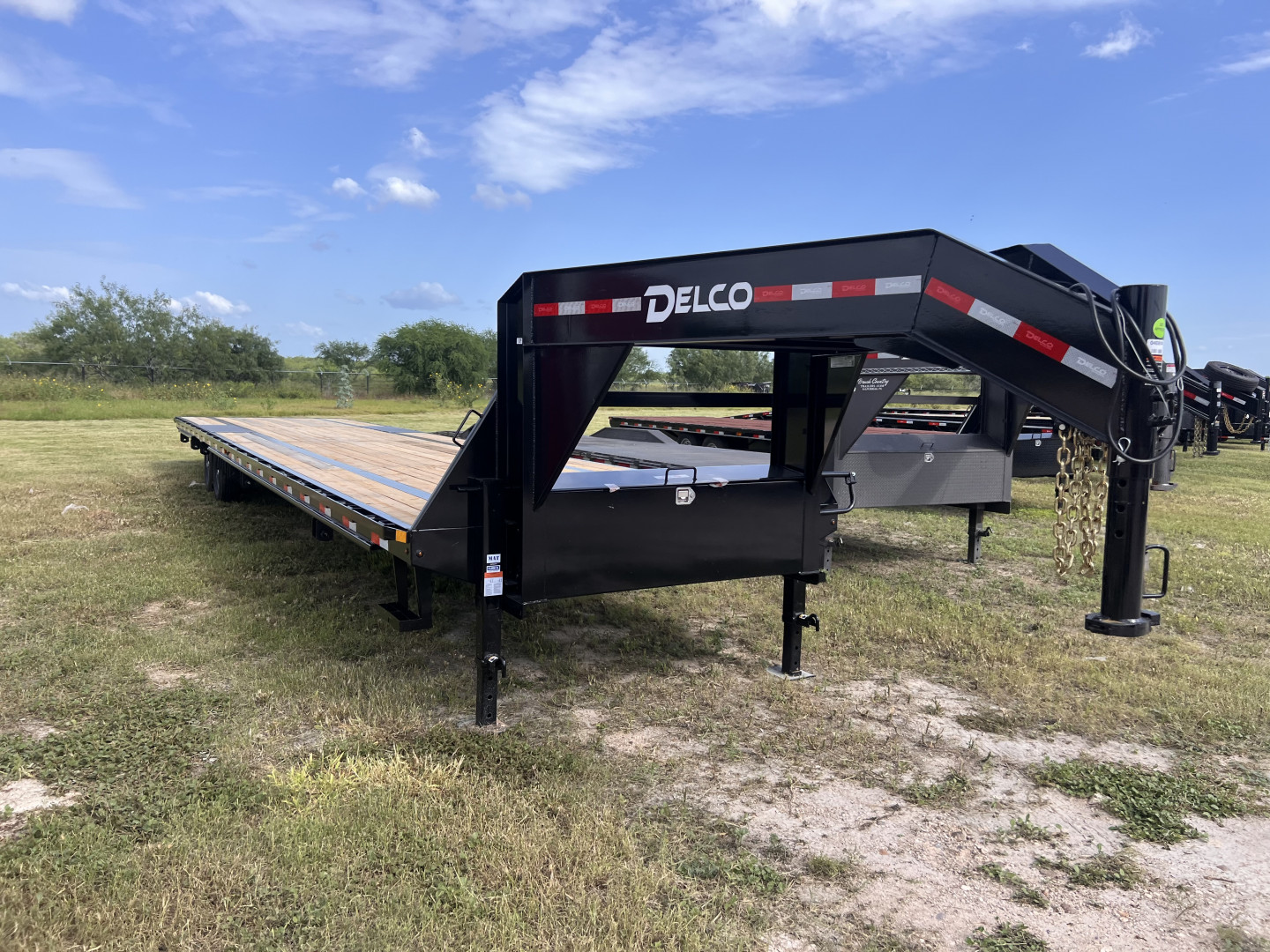 New 2025 Delco Trailers 102x40ft Flatbed Trailer 14k