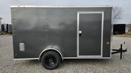 New 2025 ROCK SOLID CARGO 6'x12'x6'3" Cargo / Enclosed Trailer, Small dent on Rear
