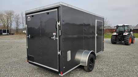 New 2025 ROCK SOLID CARGO 6'x12'x6'3" Cargo / Enclosed Trailer, Small dent on Rear