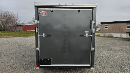 New 2025 ROCK SOLID CARGO 6'x12'x6'3" Cargo / Enclosed Trailer, Small dent on Rear