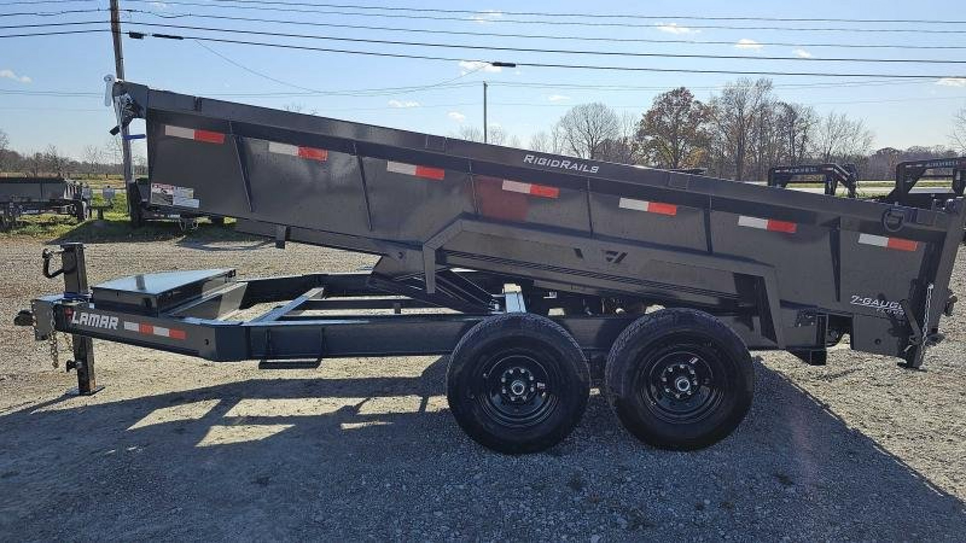 New 2024 LAMAR TRAILERS 83" x 14' Dump Trailer