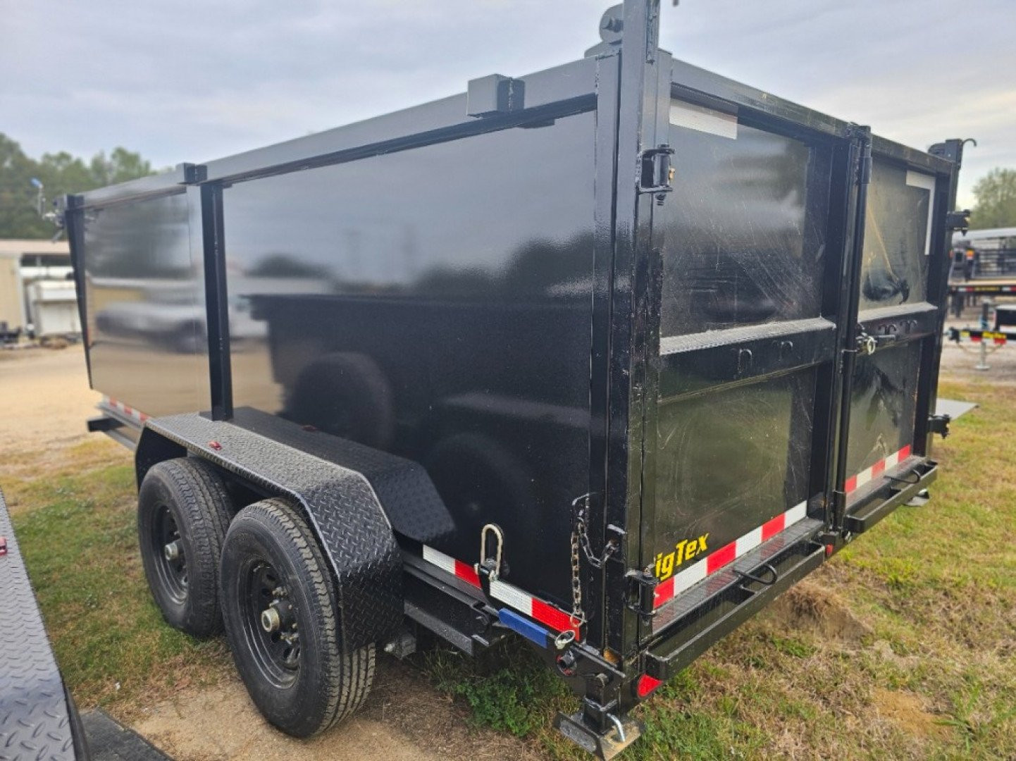 New 2025 Big Tex Trailers 14LX-14C4A-BK Dump Trailer