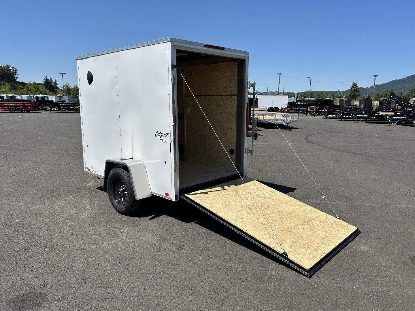New 2025 Pace American 5X8 Outback DLX Flat Top Enclosed Trailer with Rear Ramp Door & Electric Brakes 3.5K GVWR