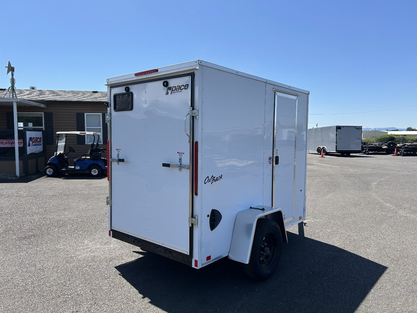 New 2025 Pace American 5X8 Outback DLX Flat Top Enclosed Trailer with Rear Ramp Door & Electric Brakes 3.5K GVWR