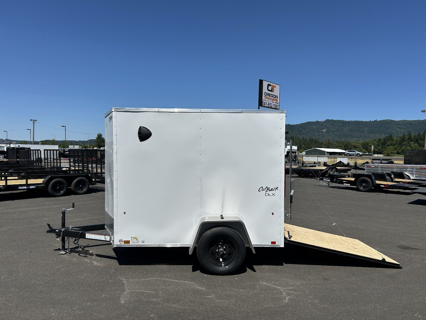 New 2025 Pace American 5X8 Outback DLX Flat Top Enclosed Trailer with Rear Ramp Door & Electric Brakes 3.5K GVWR