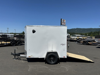 New 2025 Pace American 5X8 Outback DLX Flat Top Enclosed Trailer with Rear Ramp Door & Electric Brakes 3.5K GVWR