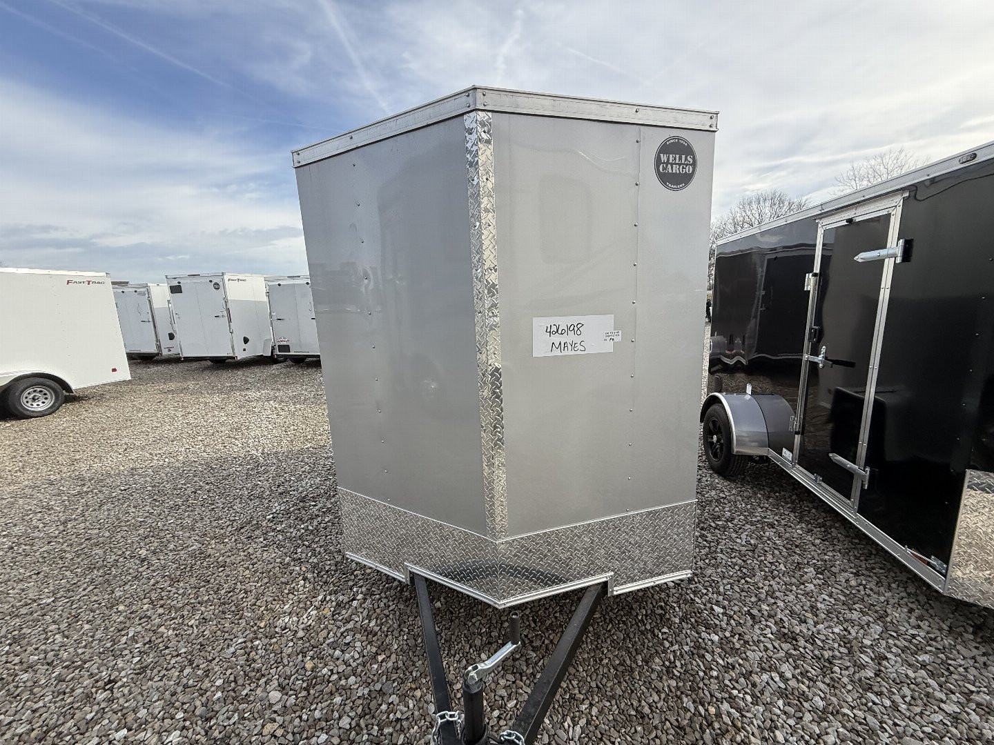 New 2025 WELLS CARGO FT610S2-D Cargo / Enclosed Trailer 6X10 SA RAMP DOOR (GVW:2990) SILVER FROST