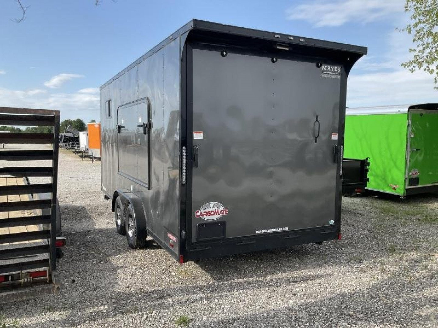 New 2022 Cargo Mate EHW718TA2 Enclosed Cargo<br />
Factory Demo<br />
No miles other than shipping<br />
7x18 TA RAMP DOOR (GVW:7000)<br />
Camper Model<br />
Pop Out Camper side mounted bed <br />
110 Power<br />
Toilet and Sink <br />
Wet Sounds Stereo