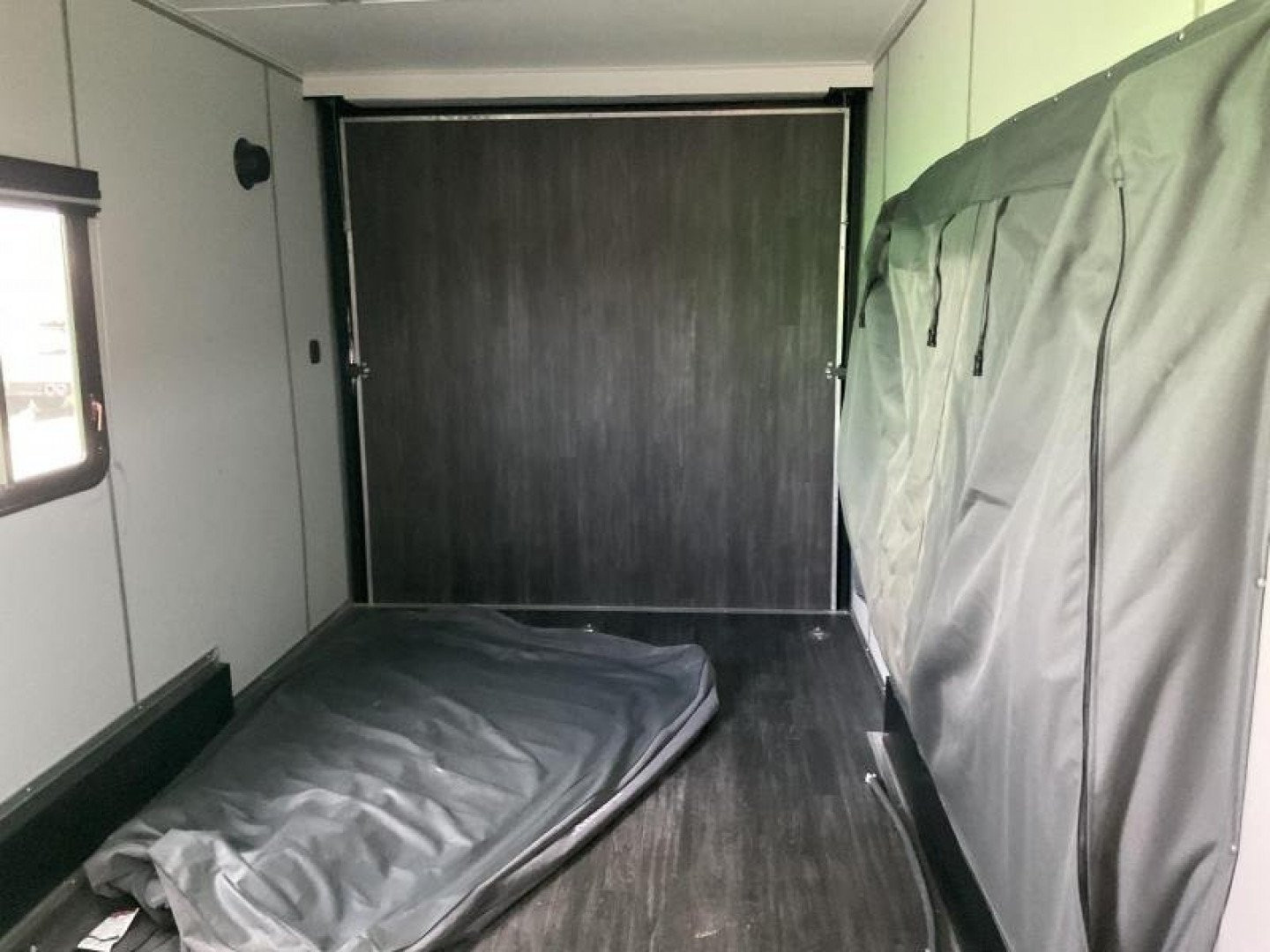 New 2022 Cargo Mate EHW718TA2 Enclosed Cargo<br />
Factory Demo<br />
No miles other than shipping<br />
7x18 TA RAMP DOOR (GVW:7000)<br />
Camper Model<br />
Pop Out Camper side mounted bed <br />
110 Power<br />
Toilet and Sink <br />
Wet Sounds Stereo
