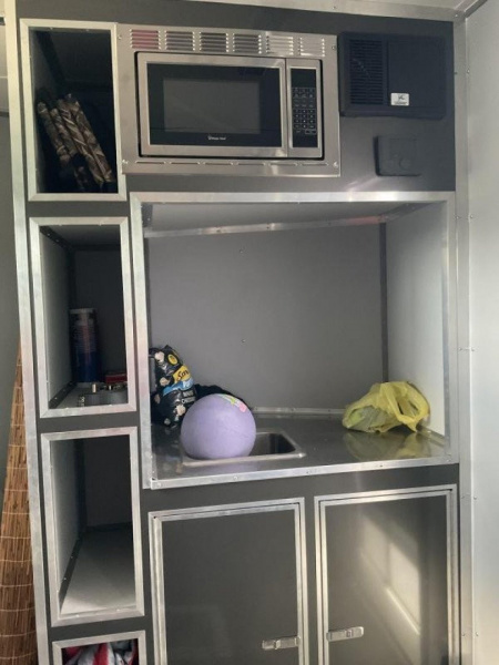 New 2022 Cargo Mate EHW718TA2 Enclosed Cargo<br />
Factory Demo<br />
No miles other than shipping<br />
7x18 TA RAMP DOOR (GVW:7000)<br />
Camper Model<br />
Pop Out Camper side mounted bed <br />
110 Power<br />
Toilet and Sink <br />
Wet Sounds Stereo