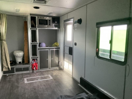 New 2022 Cargo Mate EHW718TA2 Enclosed Cargo<br />
Factory Demo<br />
No miles other than shipping<br />
7x18 TA RAMP DOOR (GVW:7000)<br />
Camper Model<br />
Pop Out Camper side mounted bed <br />
110 Power<br />
Toilet and Sink <br />
Wet Sounds Stereo