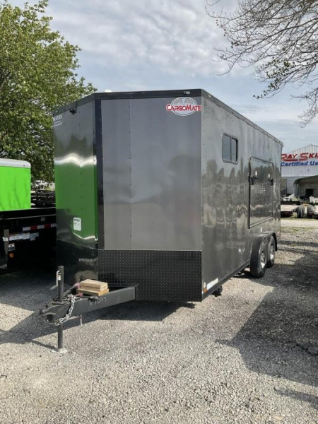 New 2022 Cargo Mate EHW718TA2 Enclosed Cargo<br />
Factory Demo<br />
No miles other than shipping<br />
7x18 TA RAMP DOOR (GVW:7000)<br />
Camper Model<br />
Pop Out Camper side mounted bed <br />
110 Power<br />
Toilet and Sink <br />
Wet Sounds Stereo