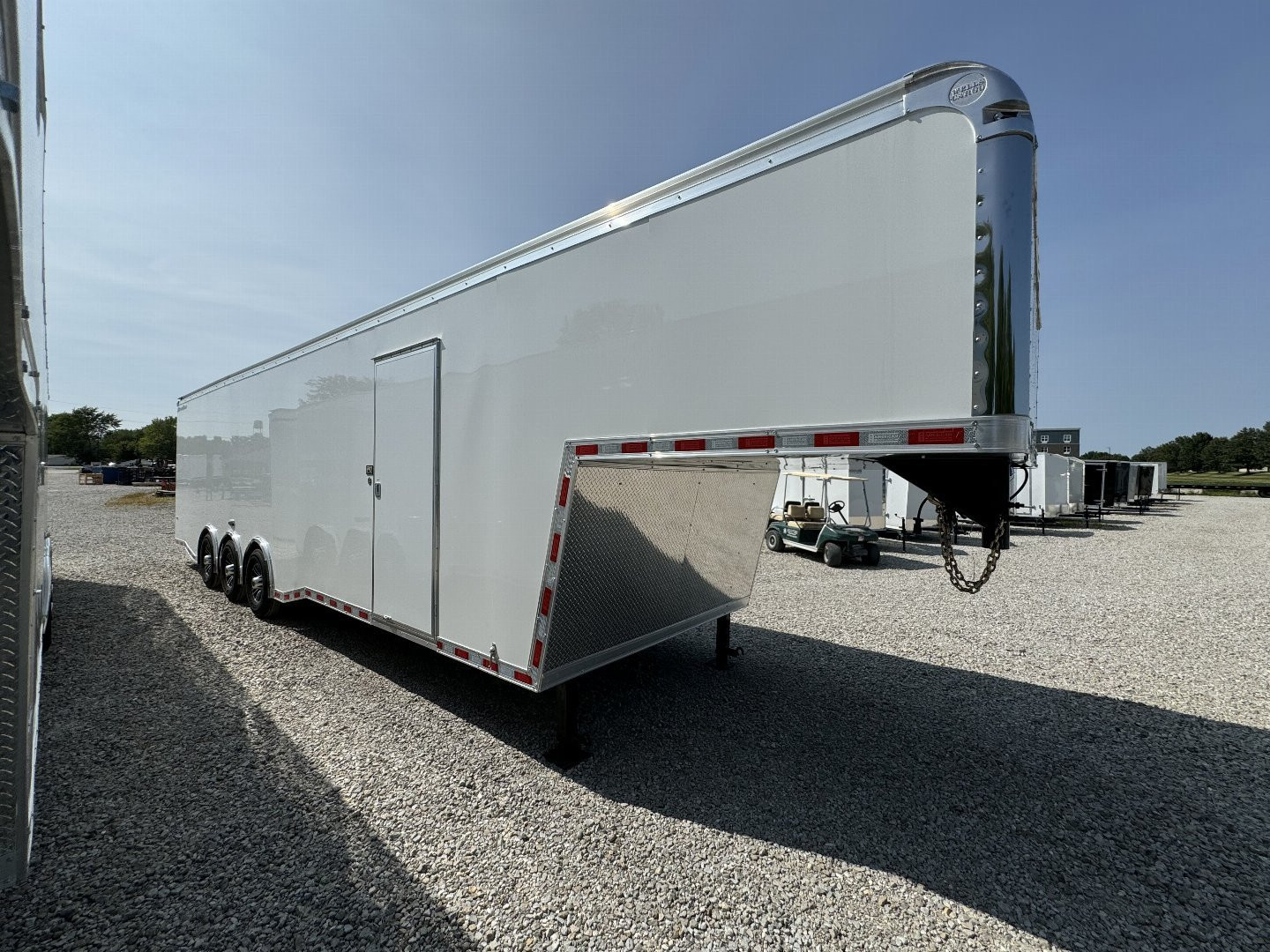New 2025 WELLS CARGO MTG8538R5 Cargo / Enclosed Trailer 102X38 TA TRI AXLE GN(GVW:21000) WHITE