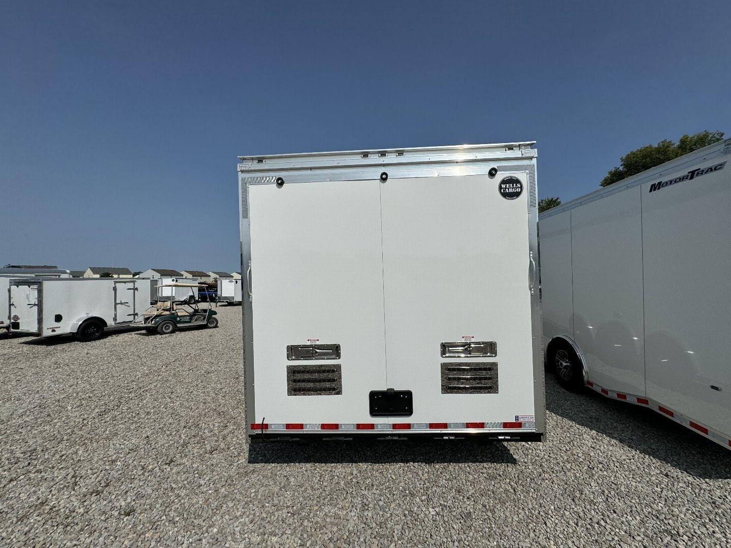 New 2025 WELLS CARGO MTG8538R5 Cargo / Enclosed Trailer 102X38 TA TRI AXLE GN(GVW:21000) WHITE