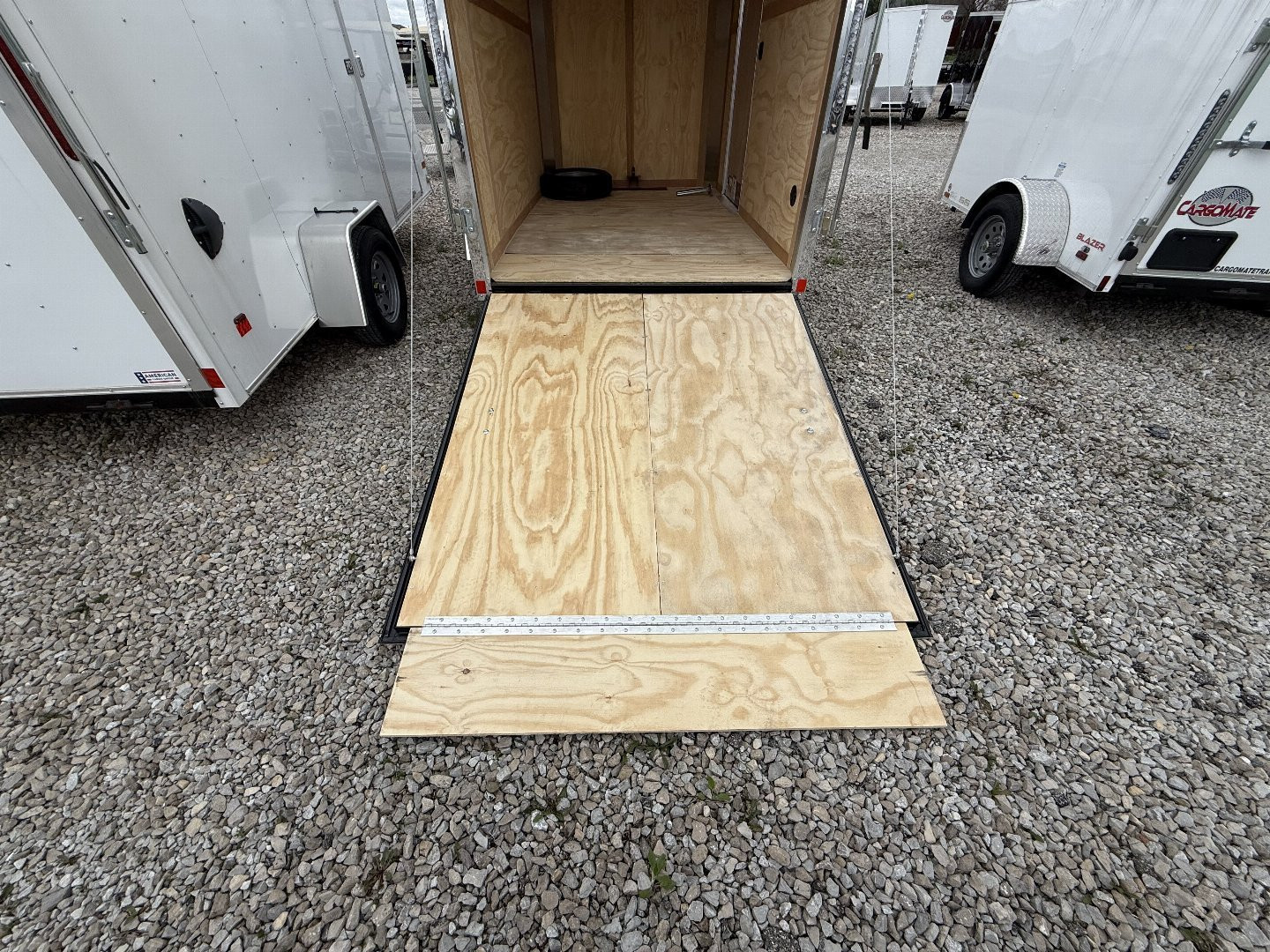 New 2025 CARGO MATE EHW610SA Cargo / Enclosed Trailer 6X10 SA RAMP DOOR (GVW:2990) WHITE