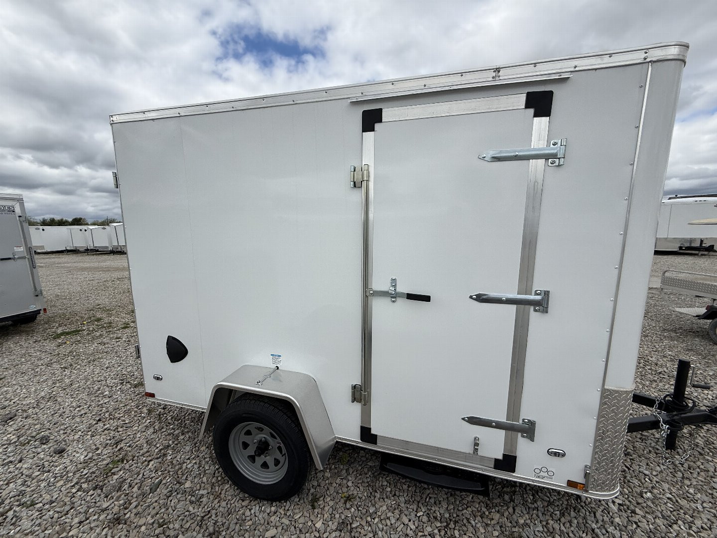 New 2025 CARGO MATE EHW610SA Cargo / Enclosed Trailer 6X10 SA RAMP DOOR (GVW:2990) WHITE