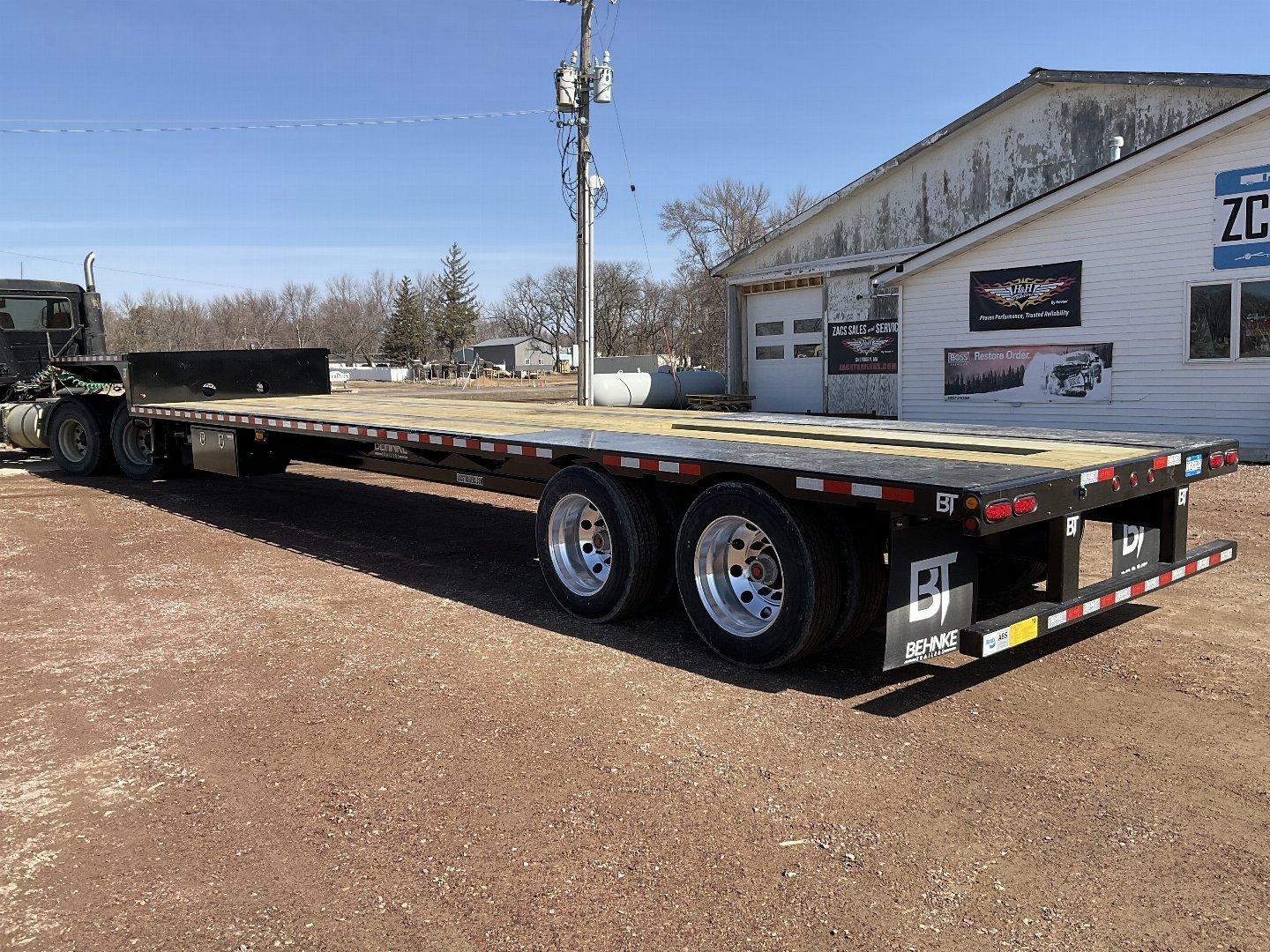 New 2025 Behnke FB8x48SS-60H Equipment Trailer