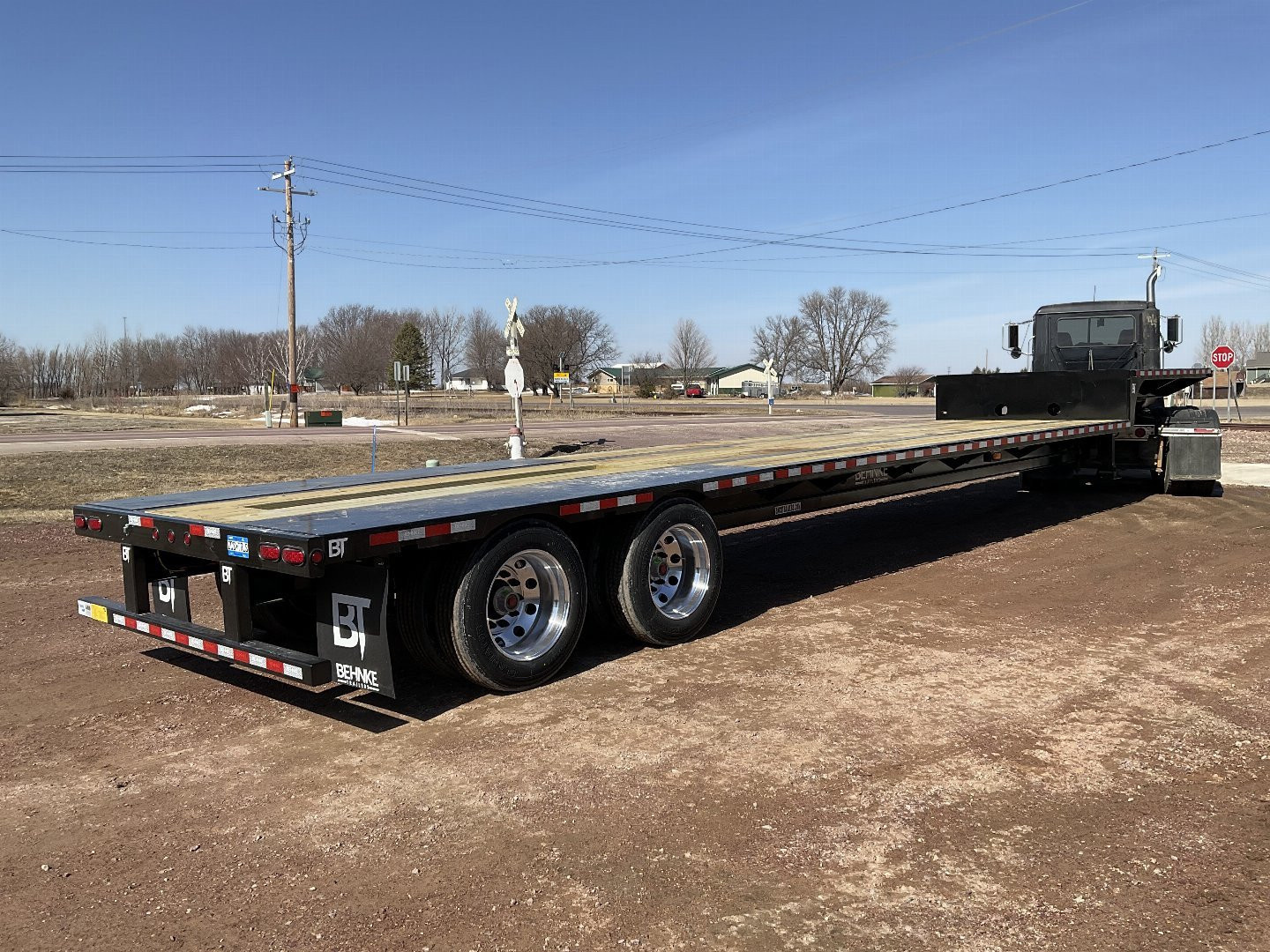 New 2025 Behnke FB8x48SS-60H Equipment Trailer