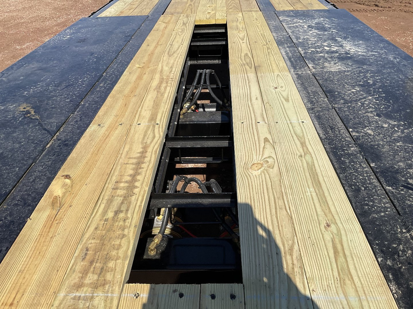 New 2025 Behnke FB8x48SS-60H Equipment Trailer