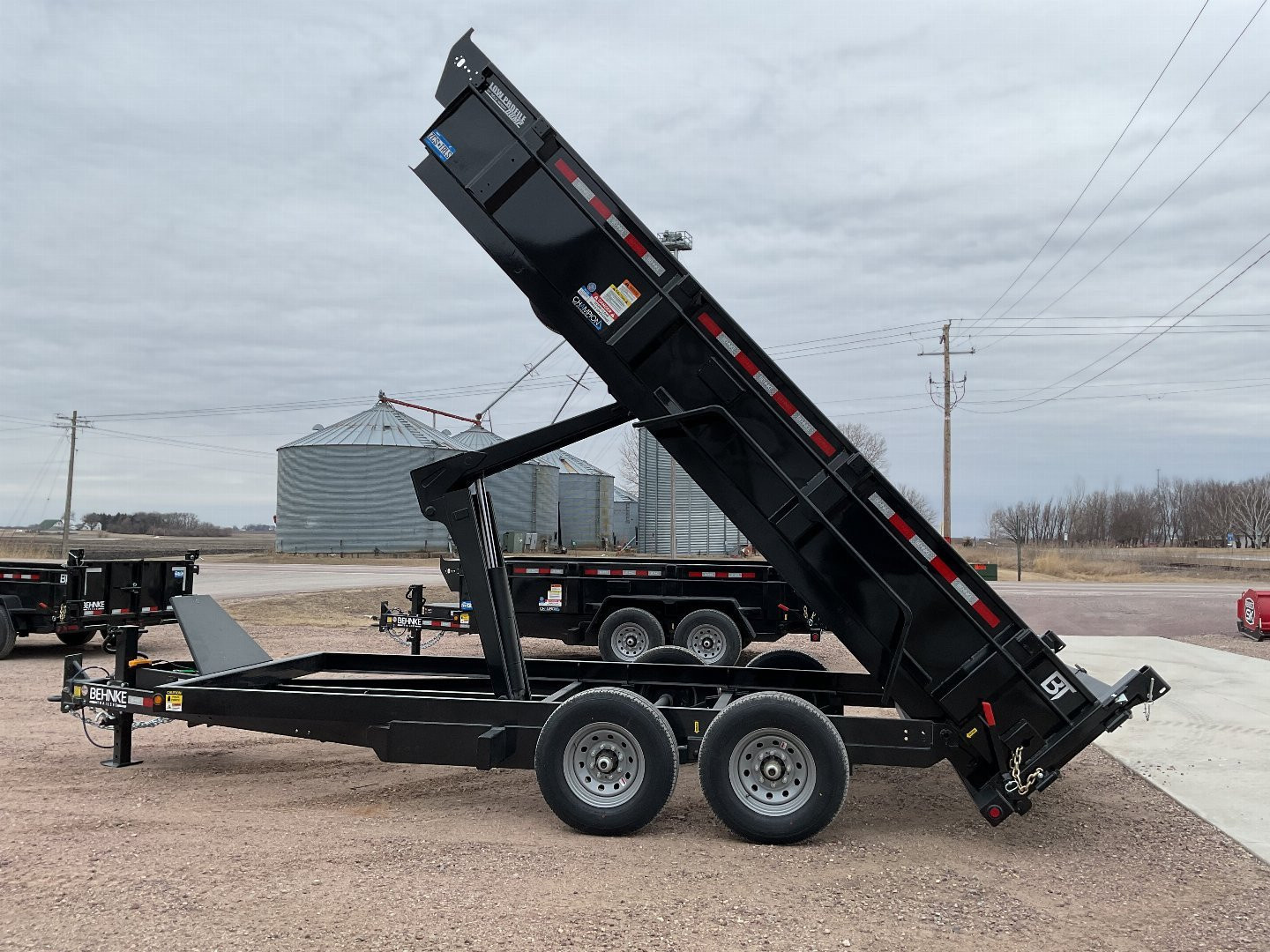 New 2025 Behnke LPD83X16E702 Dump Trailer