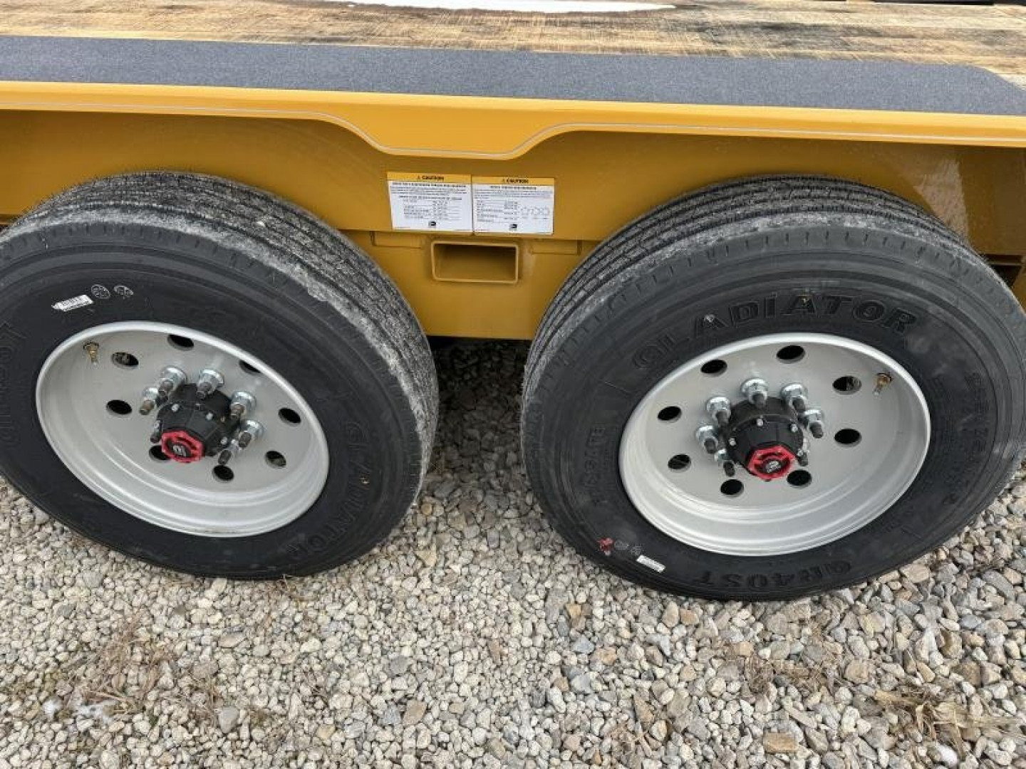 New 2025 Behnke CBCT2020E-S10K Equipment Trailer 83X20 TA SKIDLOADER BEAVERTAIL W/FLIP-UP RAMPS (GVW:20000) CAT YELLOW