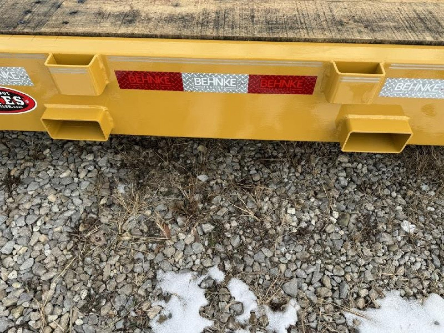 New 2025 Behnke CBCT2020E-S10K Equipment Trailer 83X20 TA SKIDLOADER BEAVERTAIL W/FLIP-UP RAMPS (GVW:20000) CAT YELLOW