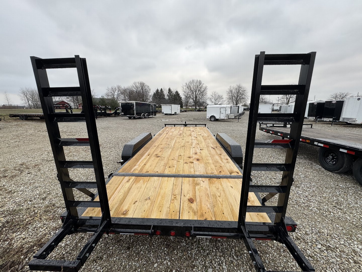 New 2025 PJ Trailers CD202 Equipment Trailer 83X20 DOVETAIL W/ FOLDUP RAMPS TA (GVW:14000) BLACK