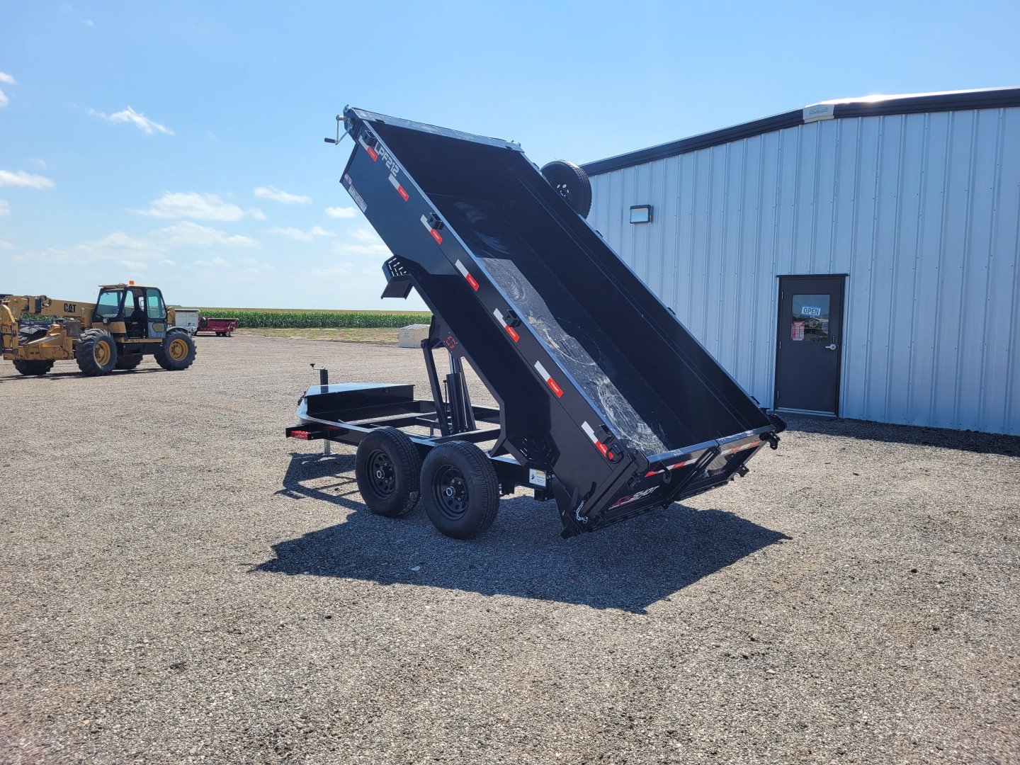 New 2025 Buckshot 72"x12' BP Dump Trailer