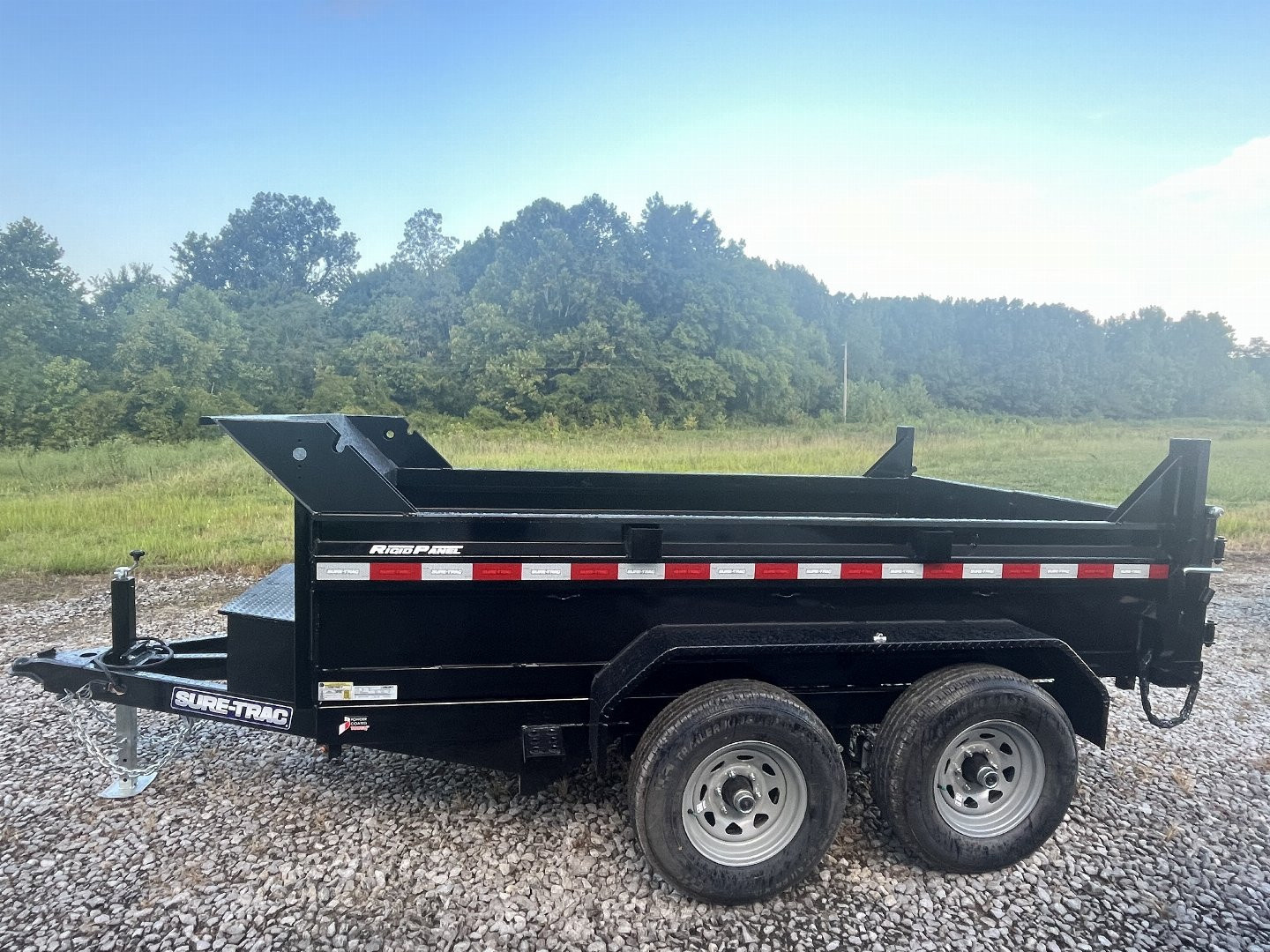 New 2025 Sure-Trac ST7210D1R-B-100 Dump Trailer