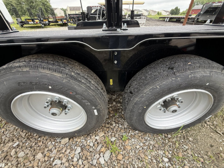 Used "NEVER USED" <br />
Plus it has the extra bucket rack welded to front raised up<br />
<br />
2023 Behnke CBCT1816E-S Equipment Trailer 83X18 TA WOOD FILLED RAMPS (GVW:12000)