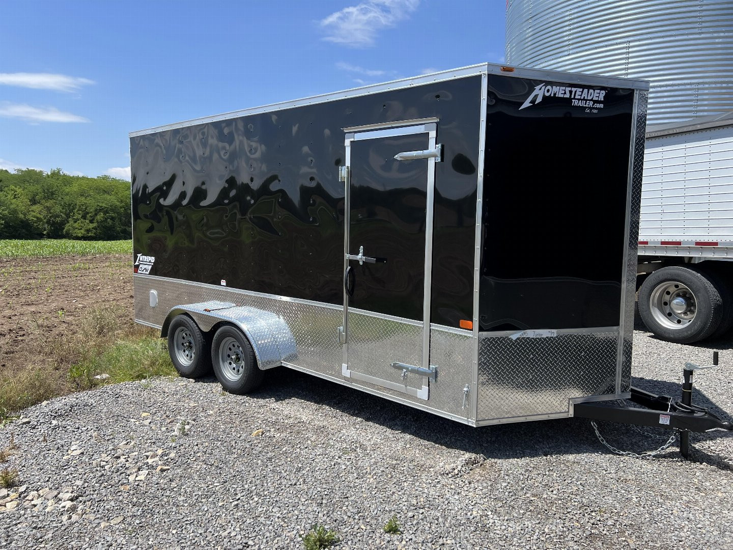 New 2025 HOMESTEADER TRAILER 7 x 16 Tandem Axle OHV Pkg Cargo / Enclosed Trailer