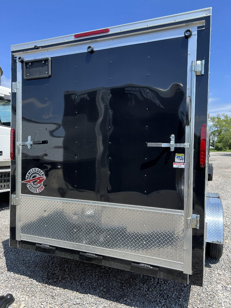 New 2025 HOMESTEADER TRAILER 7 x 16 Tandem Axle OHV Pkg Cargo / Enclosed Trailer