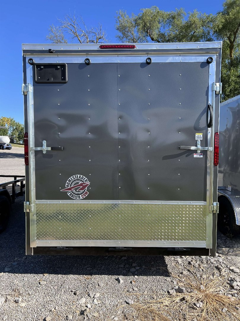 New 2025 HOMESTEADER TRAILER 7 x 14 Tandem Axle OHV Pkg Cargo / Enclosed Trailer