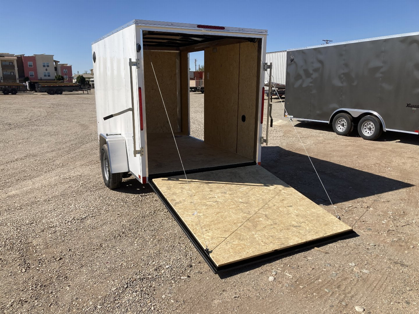 New 2025 Cargo Express DLX 6X10 Cargo / Enclosed Trailer
