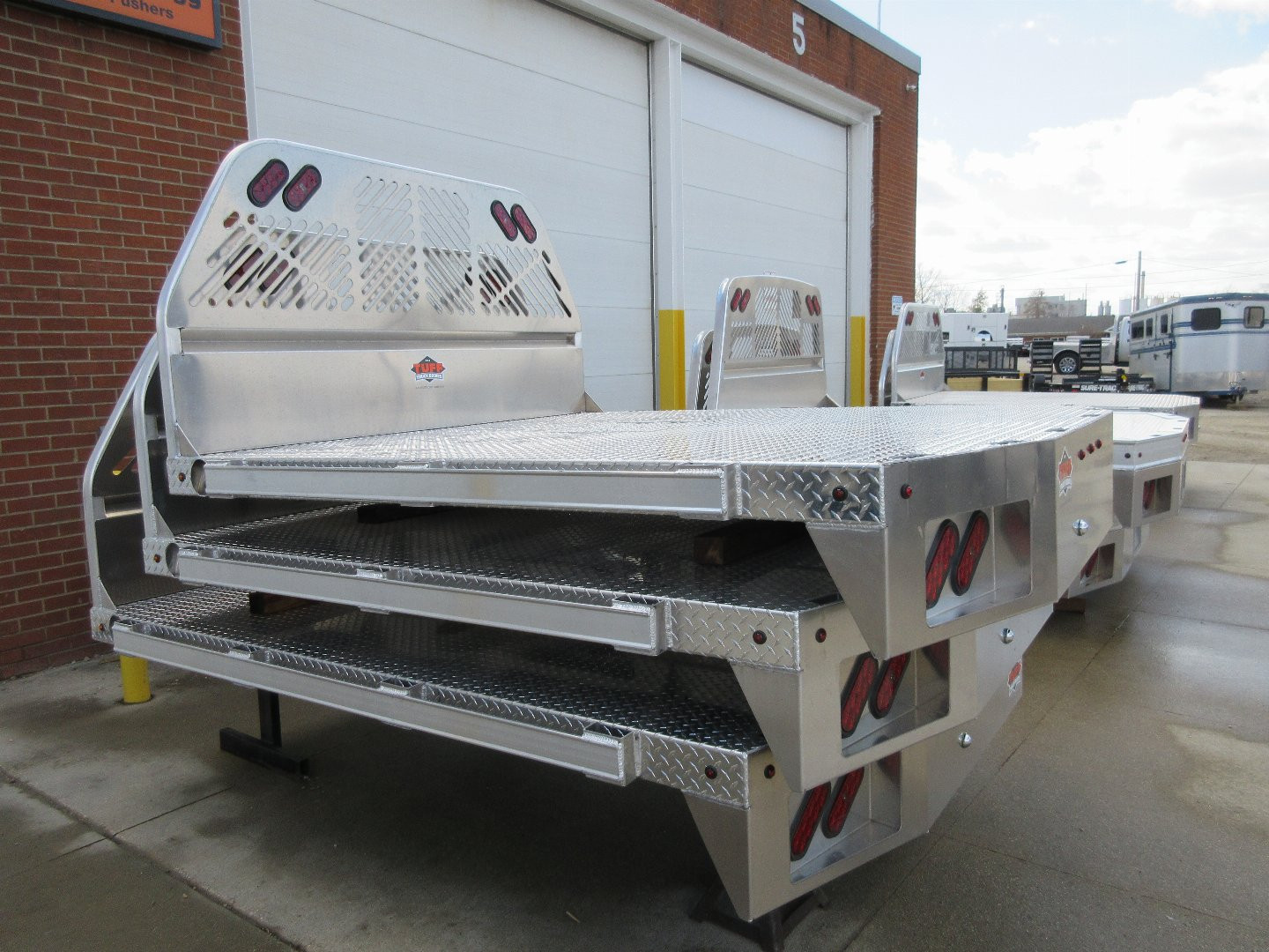 New 2025 Tuff Truck Bodies Truck Bed 8'6"X84" ECONOMY ALUMINUM RANCHER W/TRAP DOOR NO HITCH