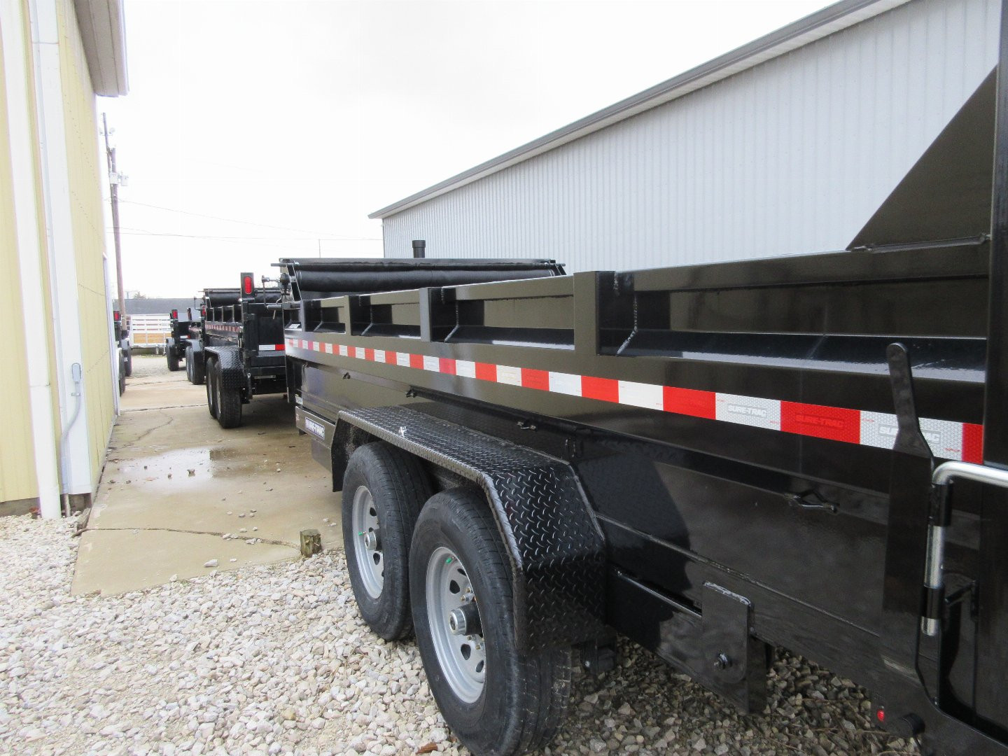 New 2025 Sure-Trac 82 x 16 HD Low Profile Dump Trailer 14K TelescopIc