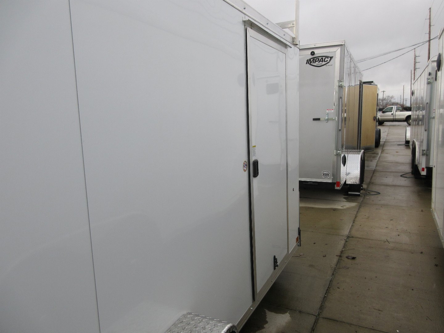 New 2025 Impact Trailers 6'X12' TREMOR FLAT TOP SLOPED V NOSE RAMP DOOR Cargo / Enclosed TraiIer