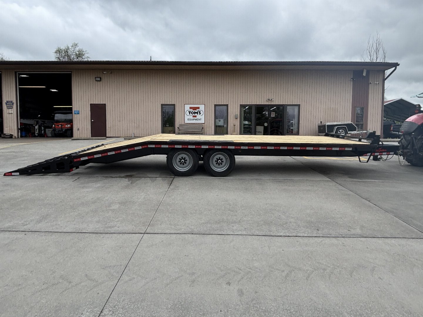 New 2025 Quality Trailers 23' Deckover (18' + 5' Dovetail) - Pro Series w/ 3 Lay Down Ramps - 17000# GVWR